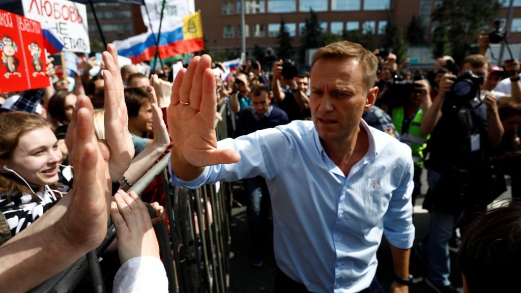 Alexei navalny top putin foe allegedly poisoned and hospitalized in a coma