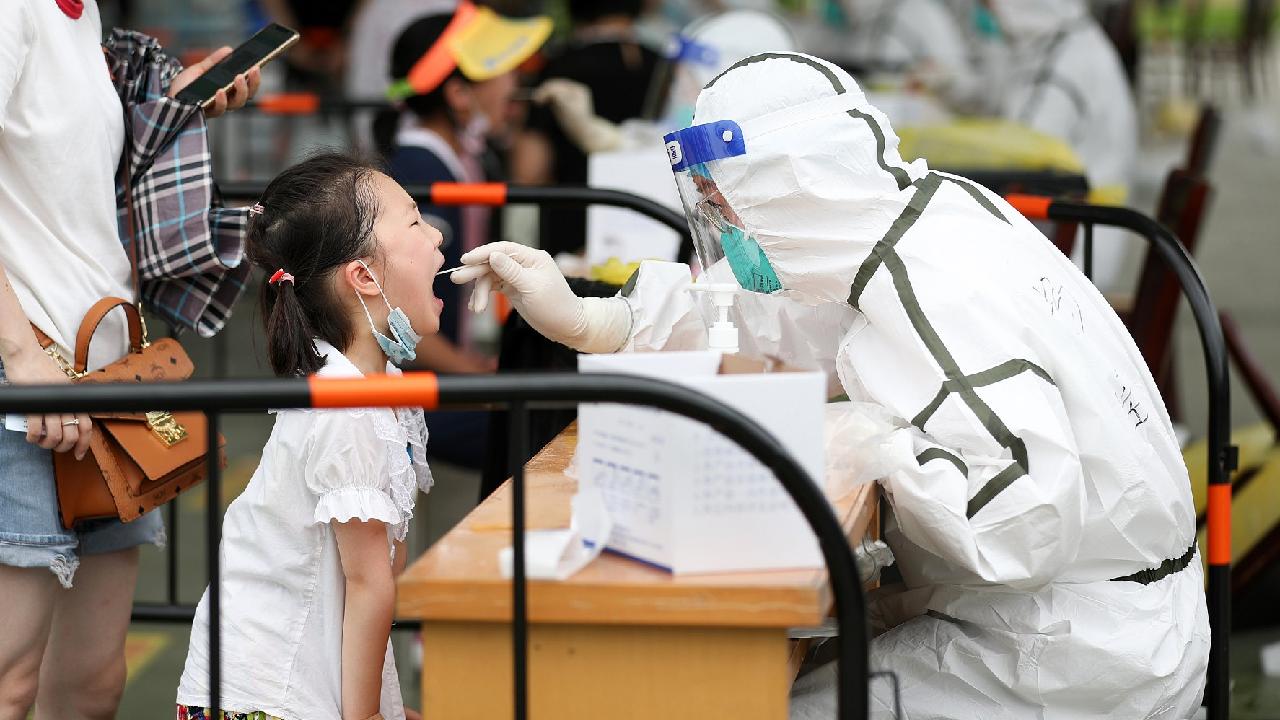 Some chinese high schools reopen as public worries about new virus outbreaks