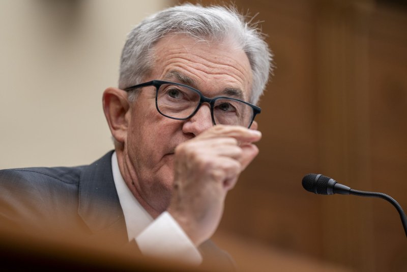 Federal reserve officials plan for higher rates as inflation threat persists