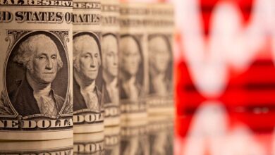 Dollar creeps up in subdued start to new year