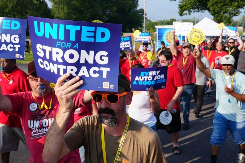 Uaw members authorize strike at ford gm stellantis