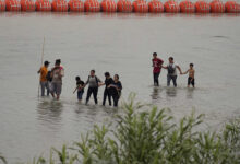 Texas governor says he will defy federal agencys request to remove floating barriers