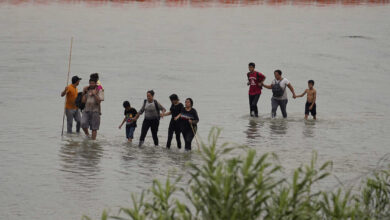 Texas governor says he will defy federal agencys request to remove floating barriers