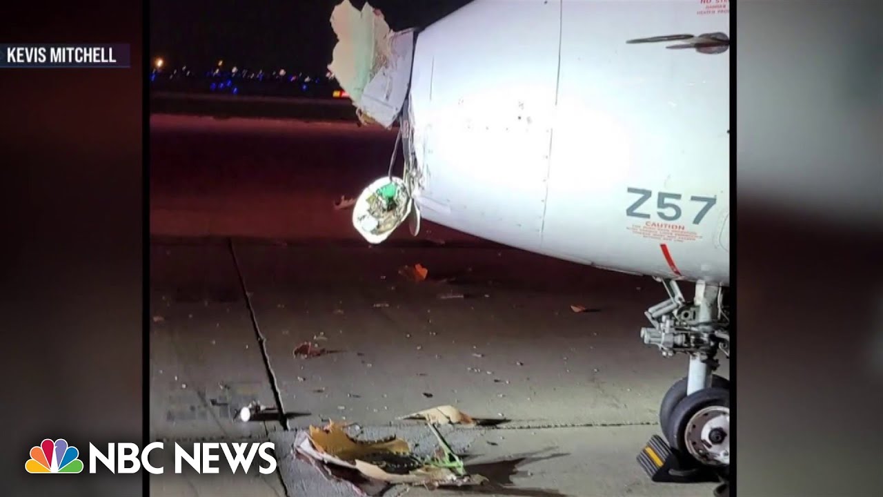 A taxiing airplane collides with a chicago airport shuttle injuring 2 people