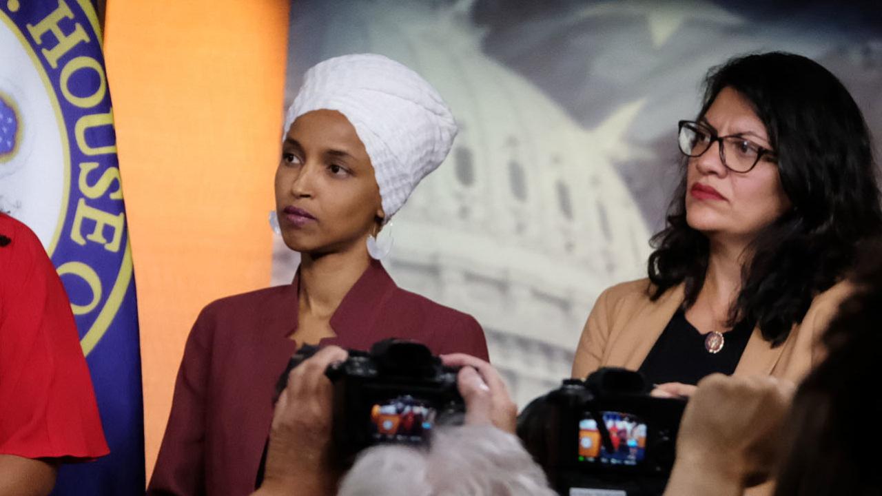 Ilhan omar accuses netanyahu of imposing muslim ban as dems decry decision to block israel visit