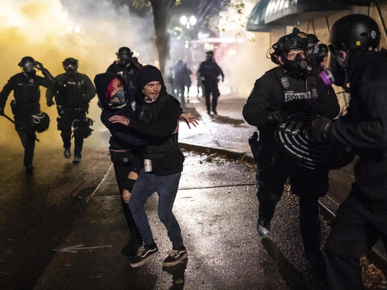 Riot officers stationgossip unlawful dozens clash Portland police declare civil disturbance amid clashes after far right far left rallies at least 13 arrested