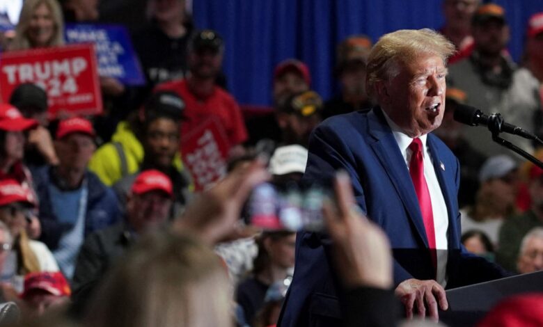 Trump stumps for state candidates in overflowing michigan rally