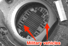 Chinese military vehicles stashed across hong kong border in soccer stadium satellite images appear to show