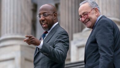 Georgia voters head to the polls for senate runoff race between warnock and walker